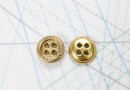 Bouton en métal doré brillant estampé 4 trous