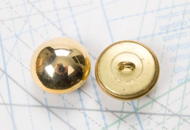 Bouton en métal doré brillant estampé boucle oméga
