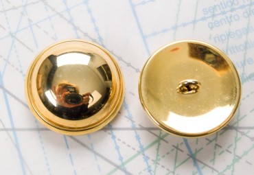 Bouton en métal doré brillant estampé boucle oméga
