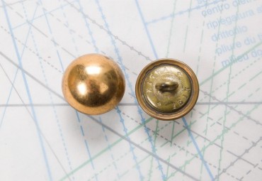 Bouton en métal cuivré orangé estampé boucle ronde soudée