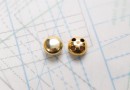 Bouton en métal doré brillant estampé 4 trous