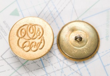 Bouton en métal doré estampé boucle en U insérée