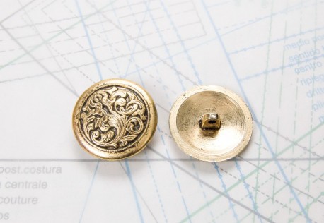 Bouton en métal doré moulé  boucle moulée