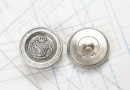 Bouton en métal argenté estampé boucle oméga